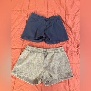 Soft lounge shorts. Grey and navy blue. Drawstring. Size medium never worn.